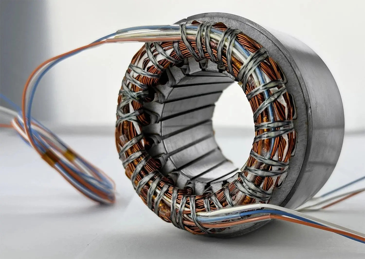 Close up of a stator with copper windings and wires
