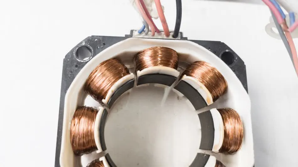 Close up view of a stator showcasing copper windings and design