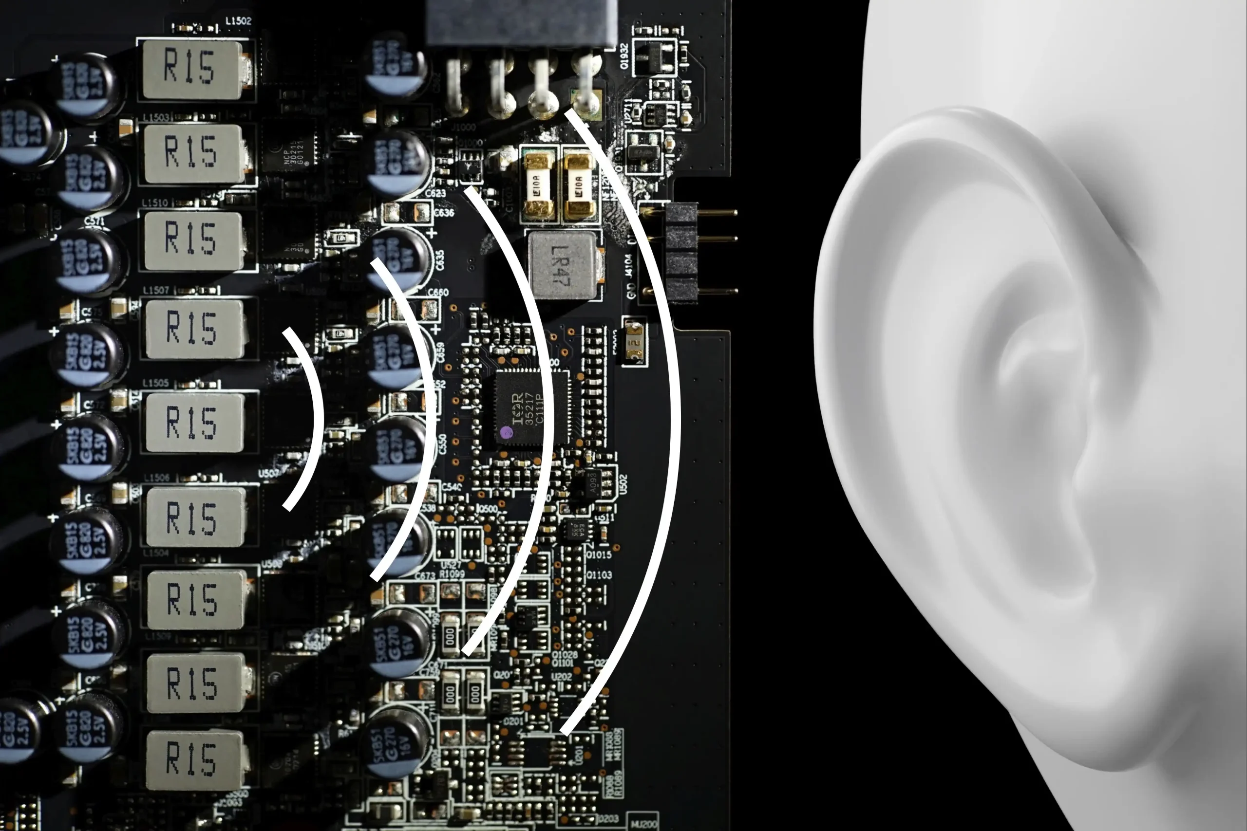 Close up of a circuit board with signals towards an ear